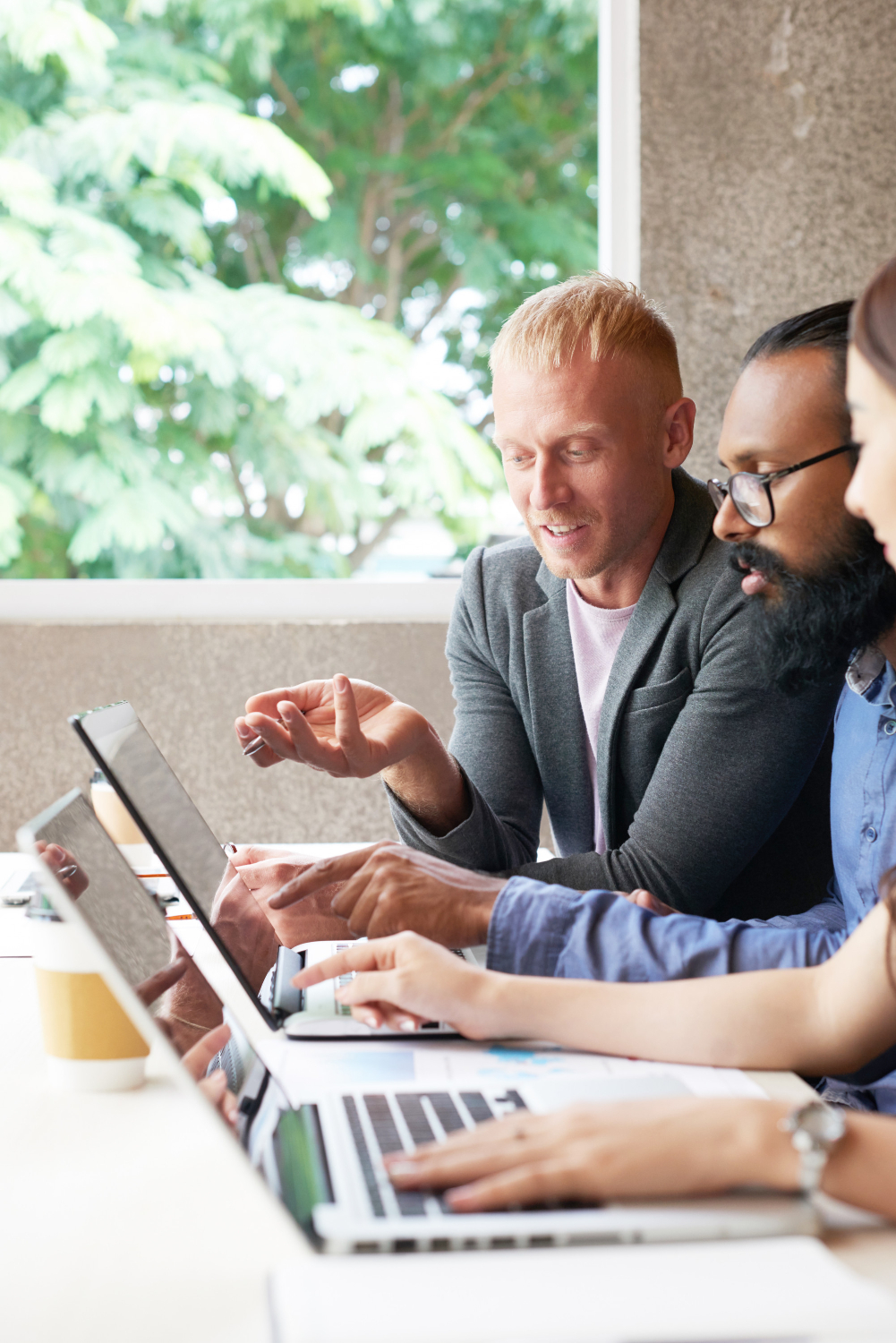 Welsh business professionals working with AI tools in 2026