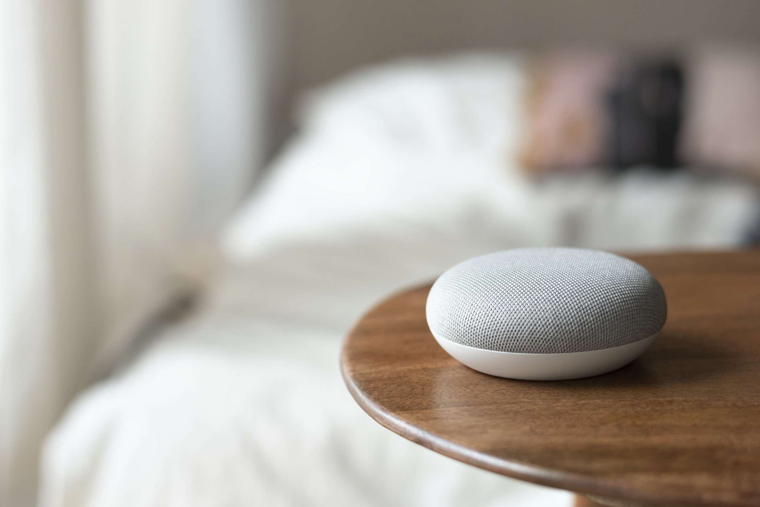Smart home living with voice instructed speaker on the table