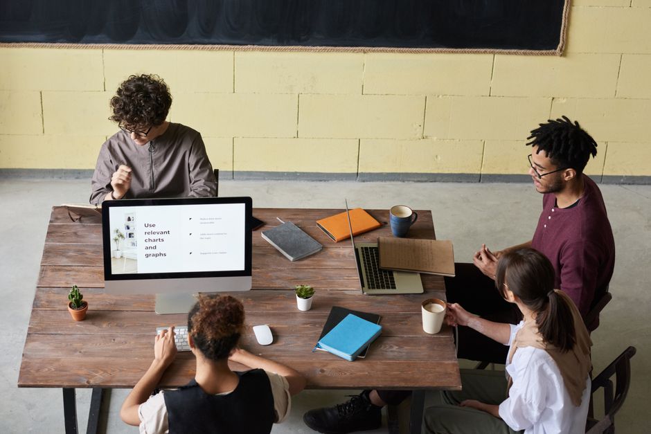 A small business team reviewing their website homepage