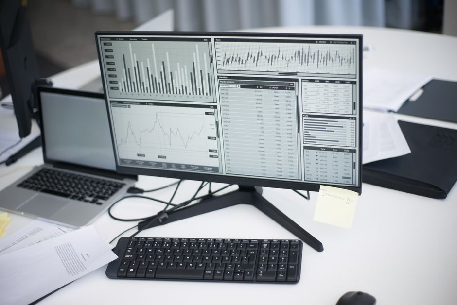 Original business data presented as charts on a screen