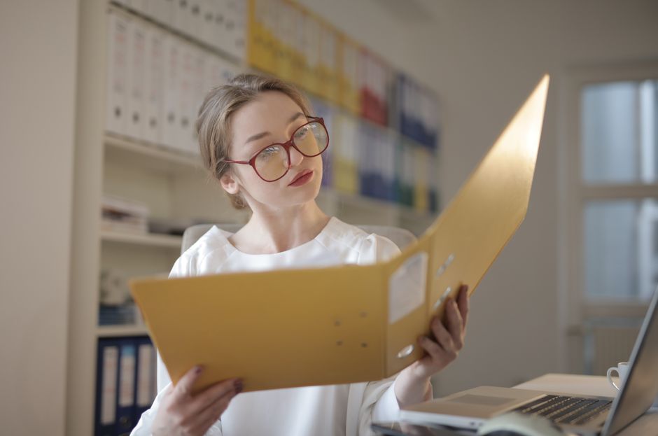 A business owner checking records and evidence before filing a suspension appeal
