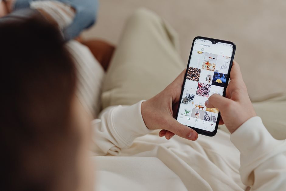 A customer scrolling a social feed where shoppable products appear alongside ordinary posts