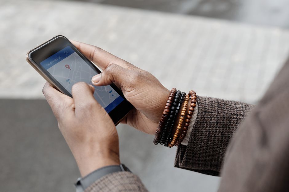 A customer searching for a local business on a smartphone map