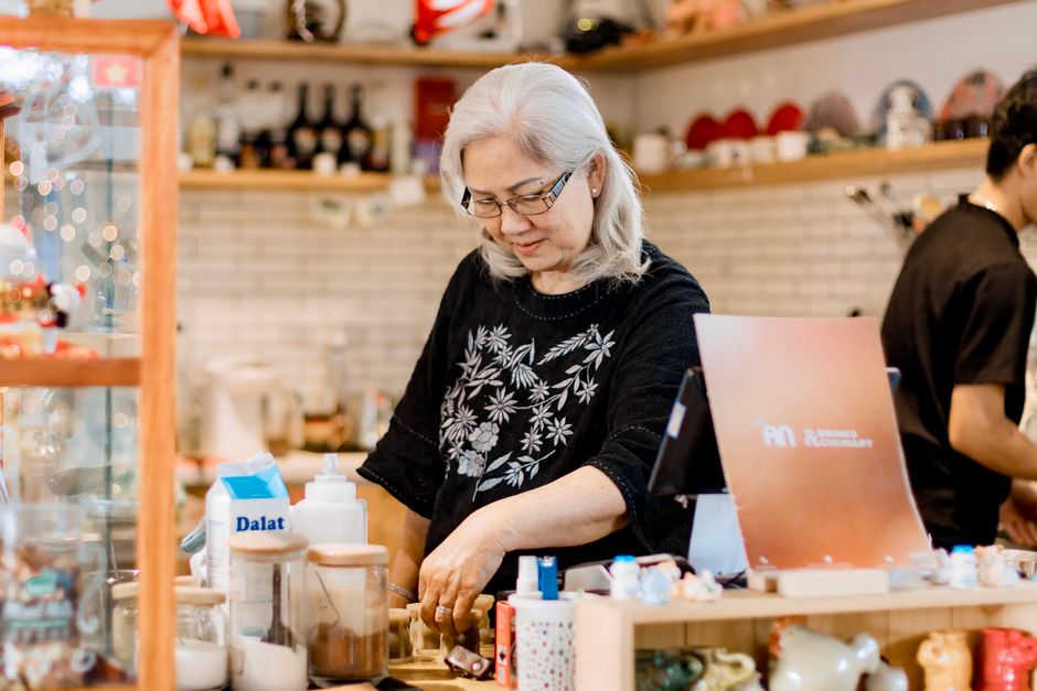A local shop owner serving a customer found through Google Maps