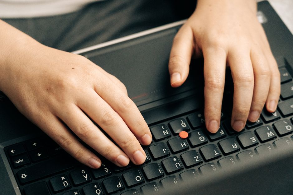 Business owner researching social media platforms for small businesses