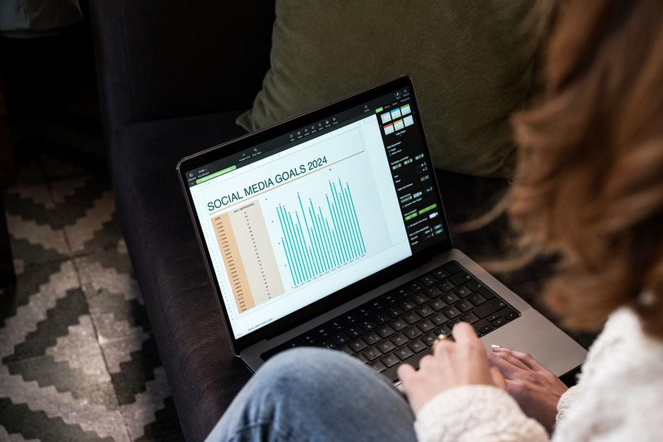 Small business owner planning social media content for 2026 on a laptop