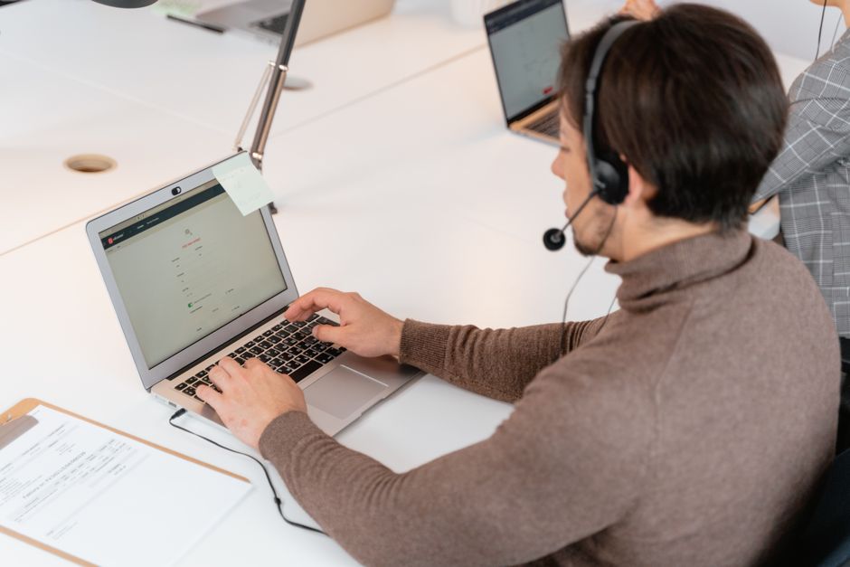A business owner writing a considered reply to a customer review