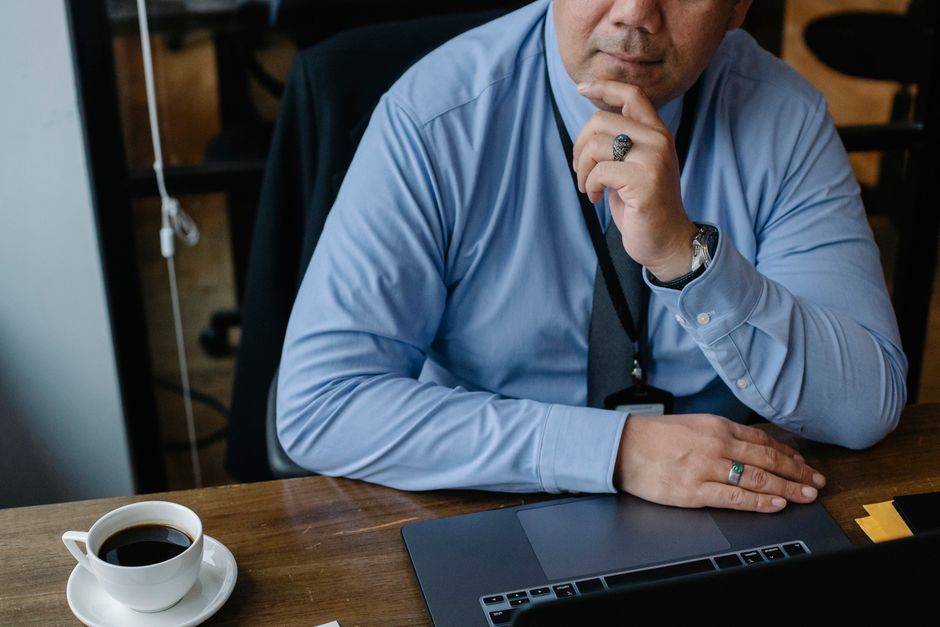 A small business owner reviewing customer records, the foundation of first-party data