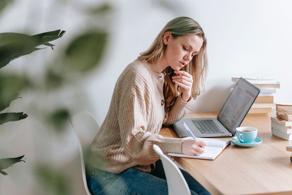 Business owner making notes about website accessibility questions