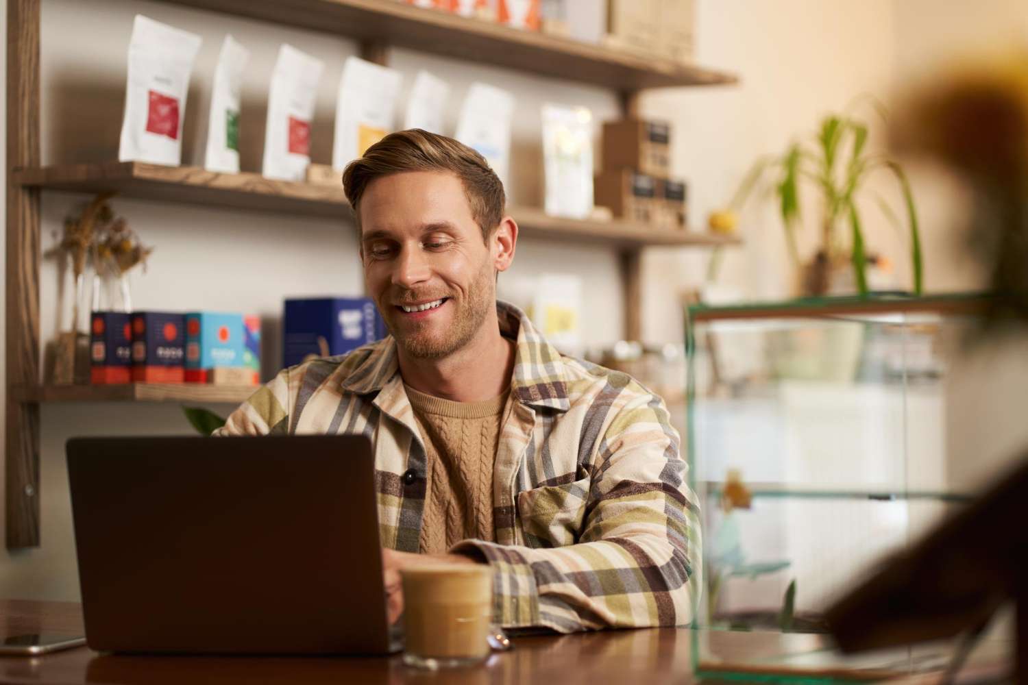 Swansea business owner going through his Google Ads account on a laptop