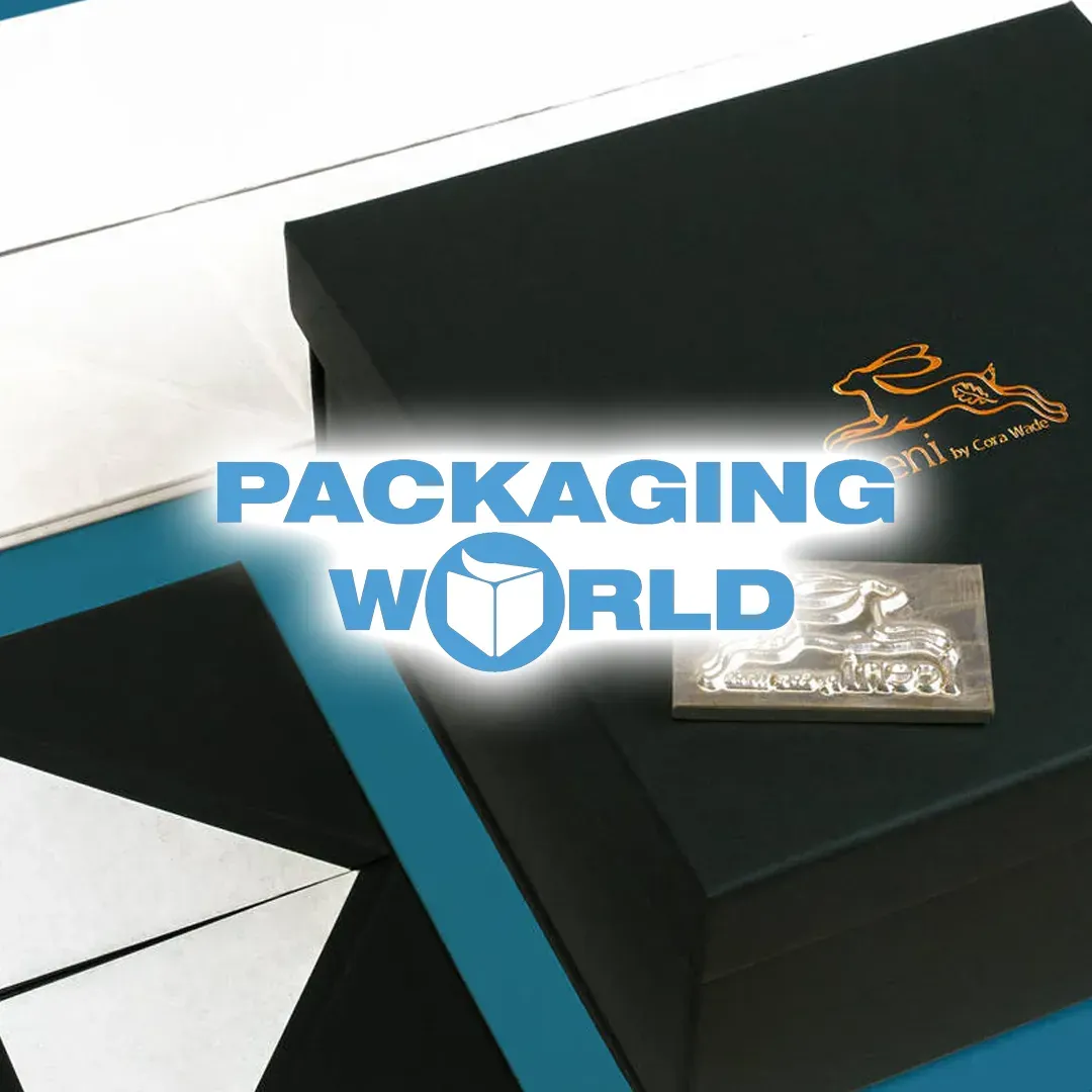 Packaging World logo over a black and blue luxury gift box