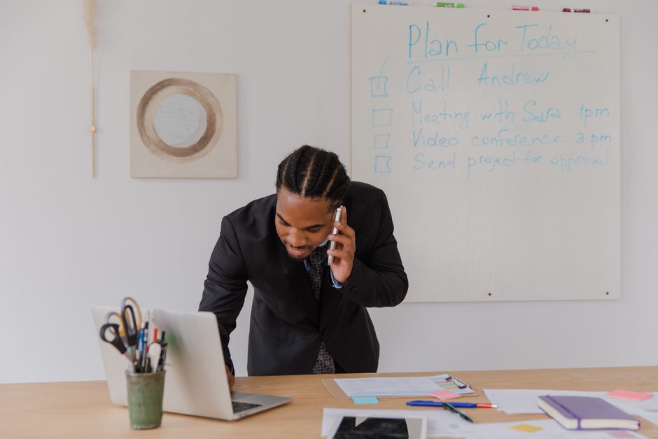 Small business owner taking a customer enquiry generated by organic search