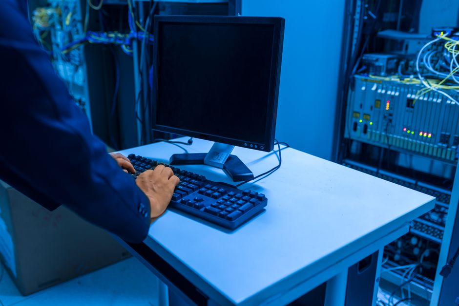 Technician configuring SPF, DKIM and DMARC records for a business domain